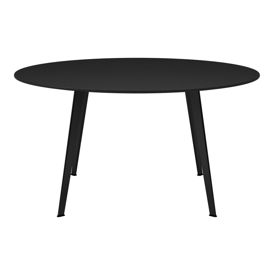 Round black table with sleek matte finish and minimalist design, perfect for modern interiors.