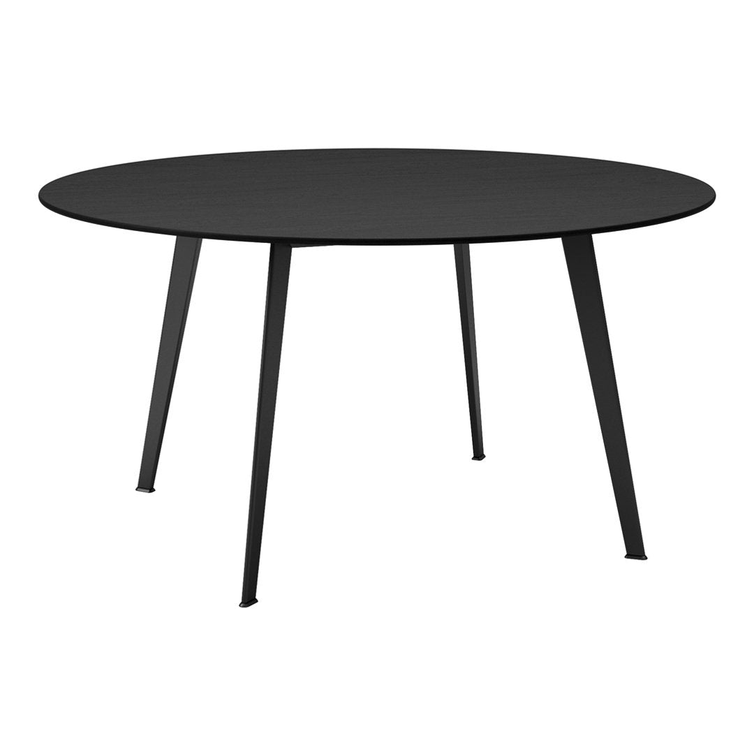 Round black dining table with a sleek design and matte finish, featuring sturdy black metal legs.