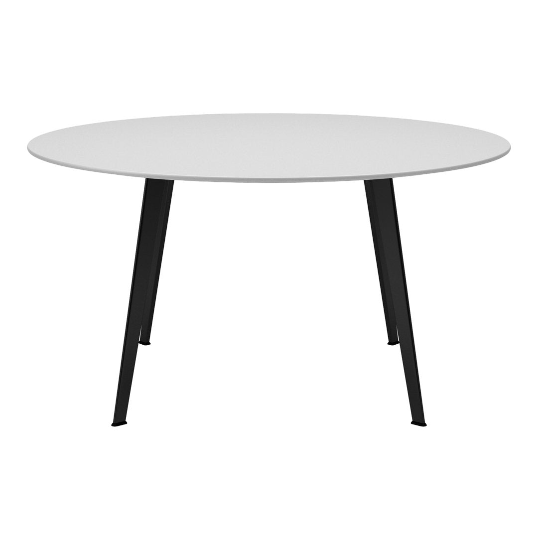 Round white tabletop with sleek black legs, perfect for modern decor. Simple design, versatile color scheme.