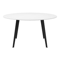 Round table featuring a sleek white surface atop black legs, combining modern simplicity and elegance.