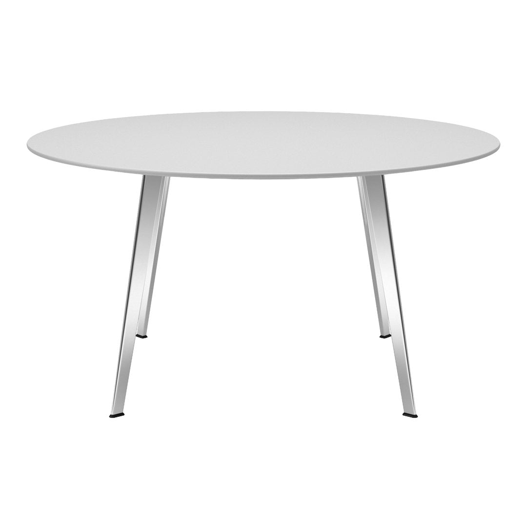 Round white table with sleek silver legs, featuring a minimalist design and smooth surface. Ideal for modern spaces.