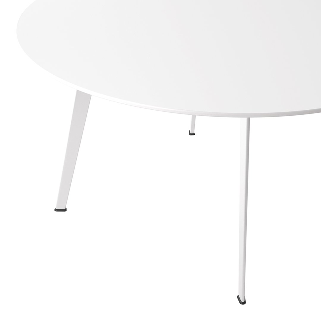 Round white table with sleek, minimalist design and black accents on legs. Ideal for modern interiors.