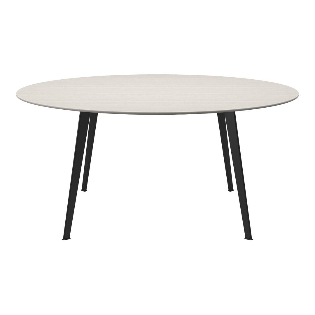 "Round table with a light beige top and sleek black legs, featuring a smooth, minimalistic design."