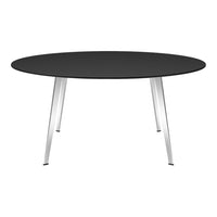 Round black table with sleek silver legs, perfect for modern decor. Minimalist design enhances any room's aesthetic.