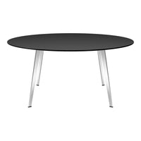 Black round table with sleek silver legs, perfect for modern decor. Minimalist design enhances any space.