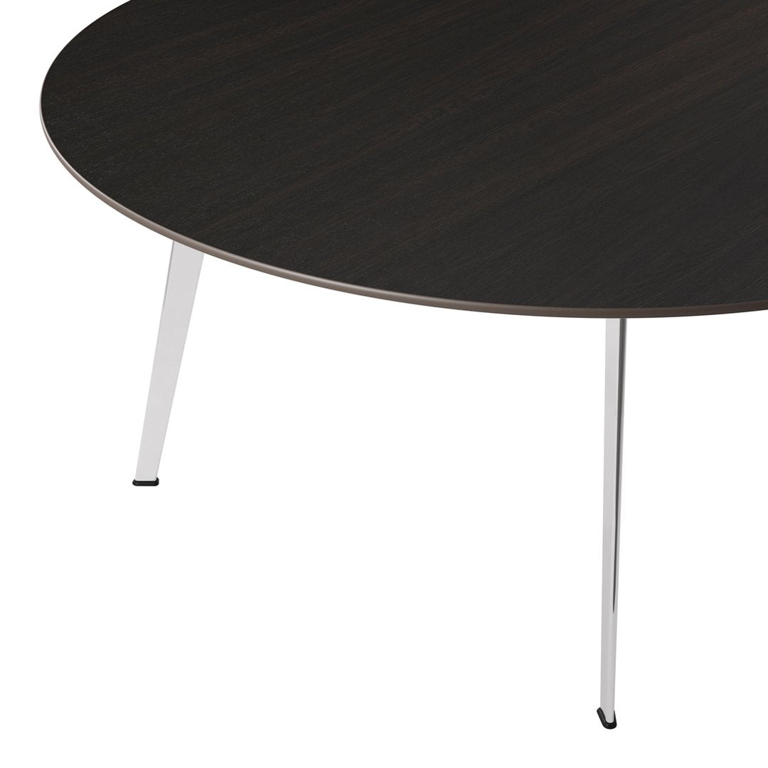 Round coffee table featuring a dark wood finish with sleek silver legs for a modern look.
