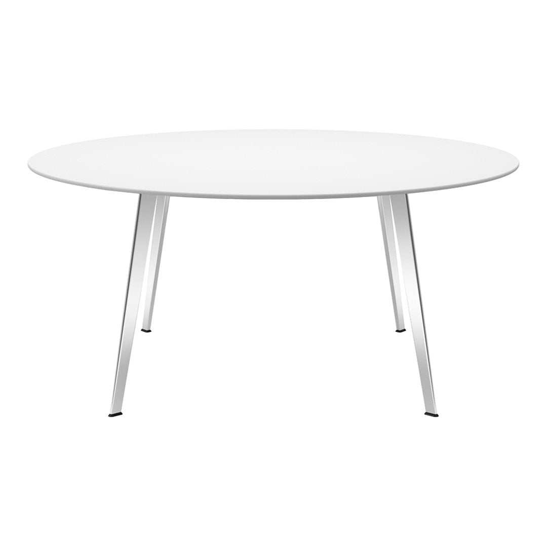Round white table with sleek silver legs, featuring a minimalist design and smooth surface for modern decor.