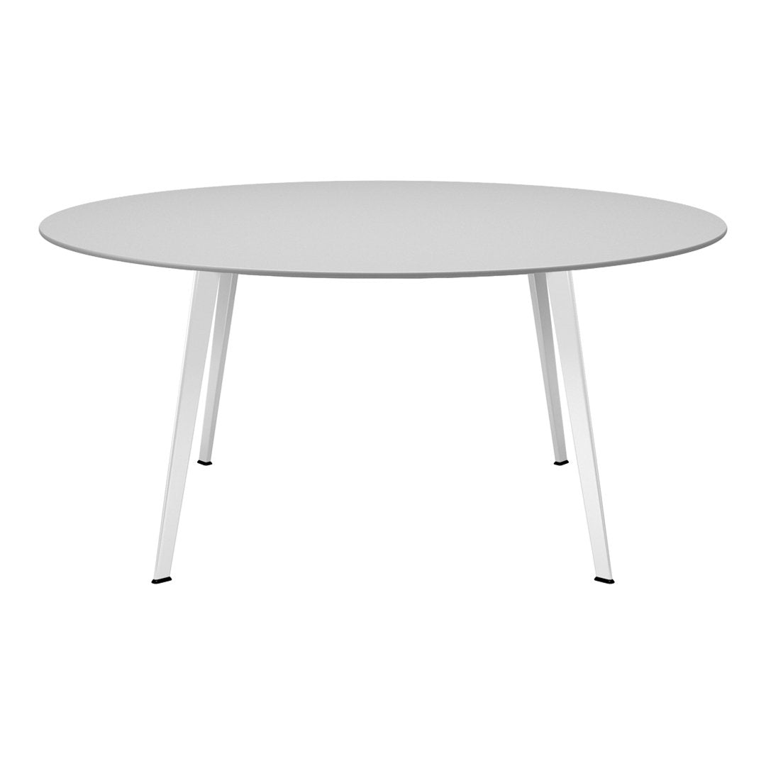 Round white dining table with sleek white legs, featuring a smooth, minimalist surface and modern design.