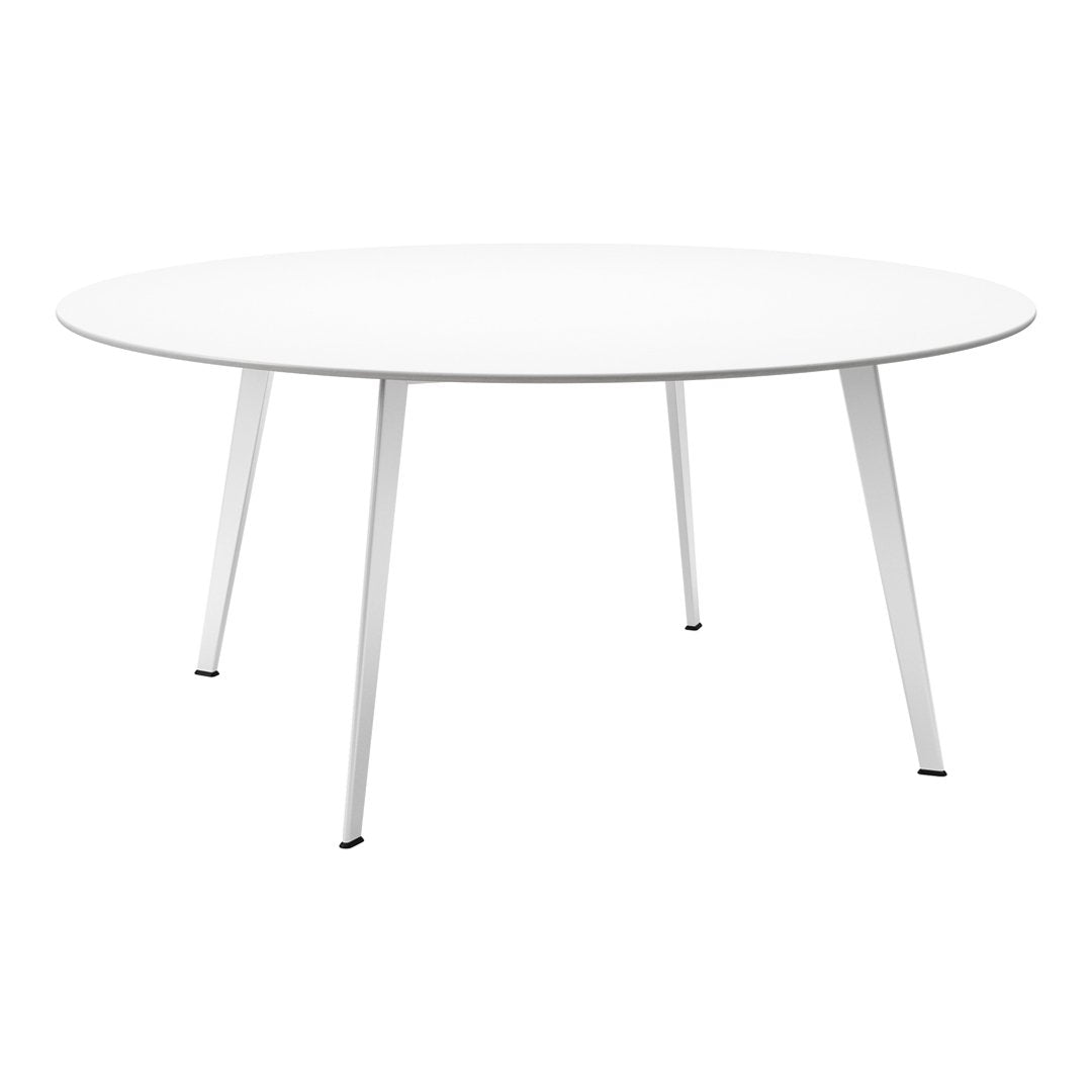 Round white dining table with sleek white legs and minimalistic design, perfect for modern interiors.