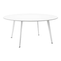 Round white dining table with sleek white legs and minimalistic design, perfect for modern interiors.