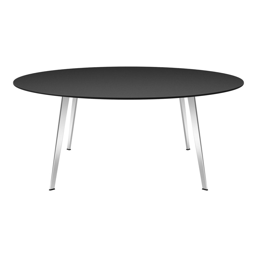 Round black table with sleek silver legs, offering a modern and minimalist design. Perfect for any contemporary space.