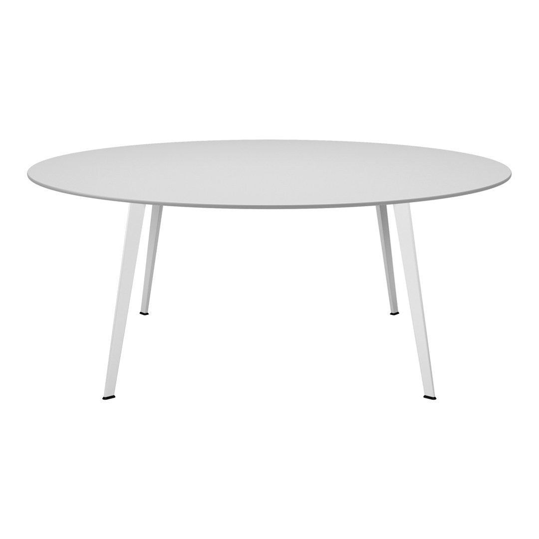 Round white table with sleek design and minimalist style, featuring clean lines and a smooth surface. Perfect for modern spaces.