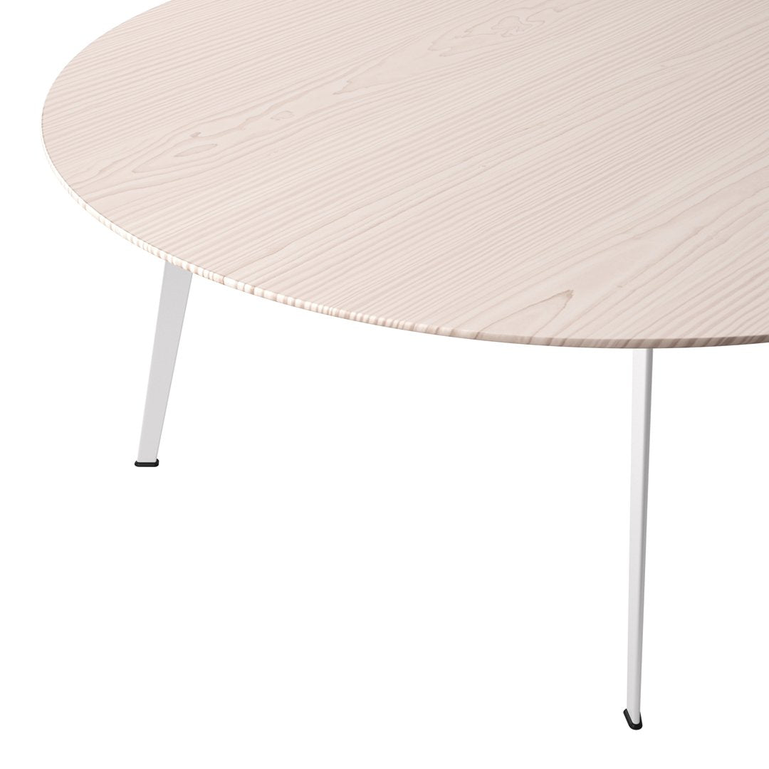 Light-colored round table with a subtle wood grain pattern and sleek white metal legs. Minimalist design for modern spaces.