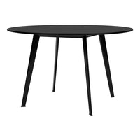 Round black table with a smooth finish and sleek black legs, perfect for modern home decor.