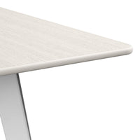 Light wood tabletop with subtle grain patterns and soft white edges, modern minimalist design.