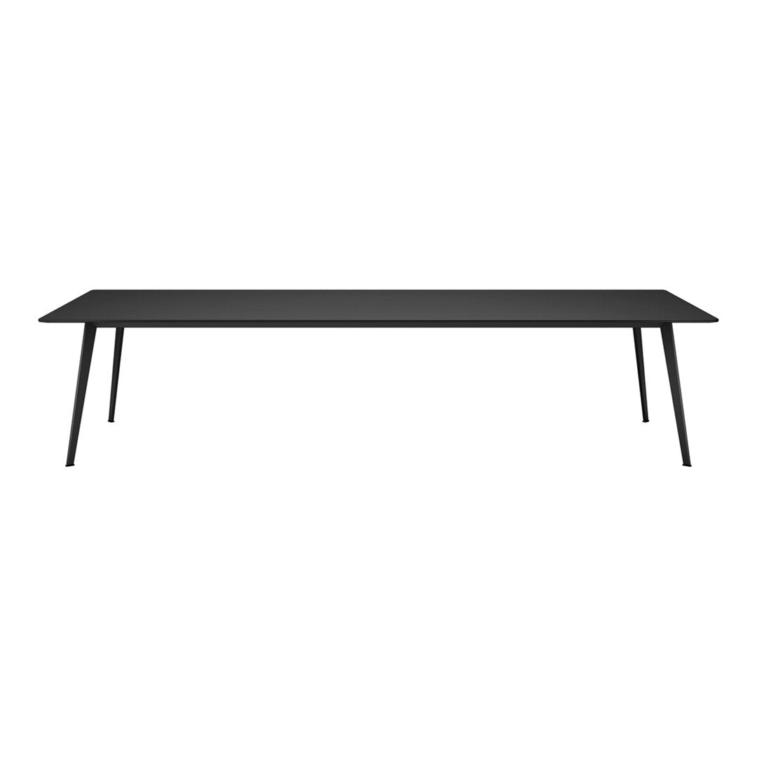 Sleek modern black rectangular table with minimalist design and tapered legs, perfect for contemporary spaces.