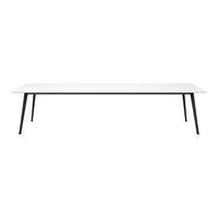 White rectangular table with sleek black legs, modern minimalist design, perfect for any contemporary space.