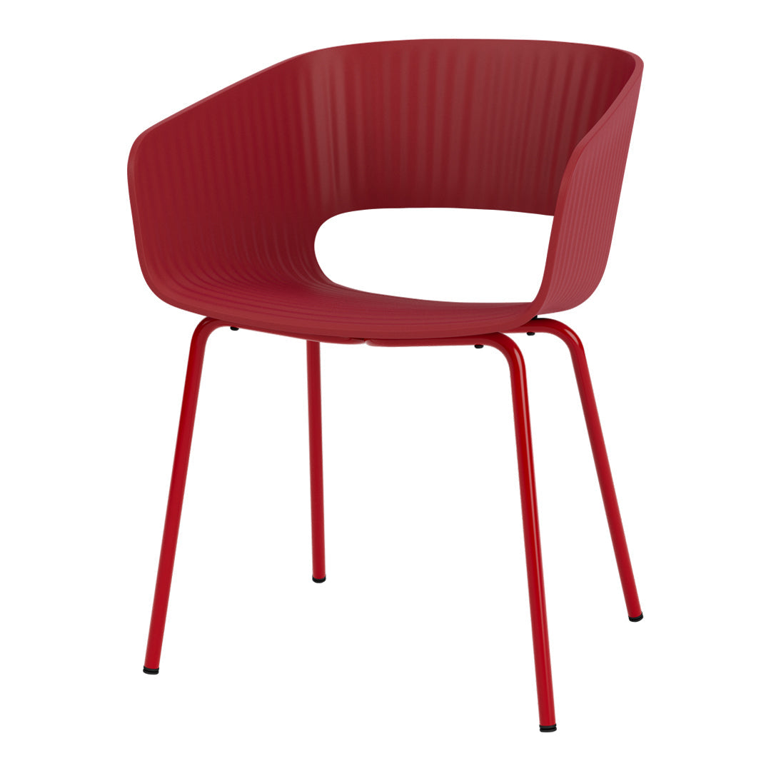 Red ribbed chair with sleek red metal legs, adding a modern touch to any decor.