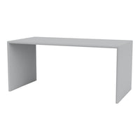 Minimalist gray desk with a sleek, modern design and smooth, flat surfaces, perfect for contemporary spaces.