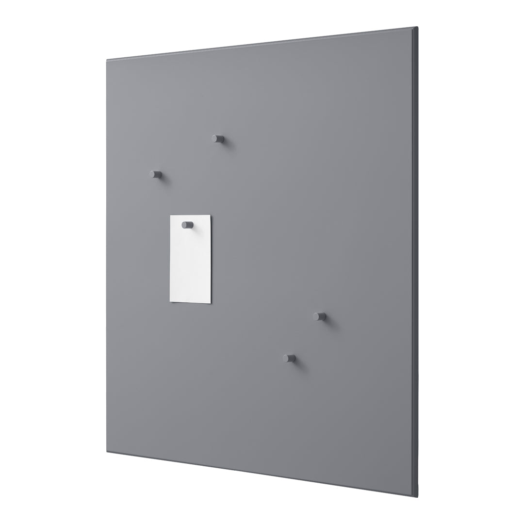 Gray wall panel with matching gray pegs and a white note holder, featuring a sleek, modern design.