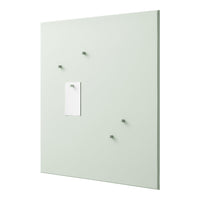 Mint green wall panel with minimalist white note holder and matching matte hooks, perfect for modern decor.