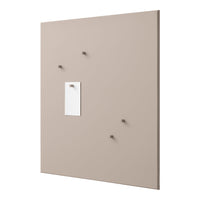 Neutral beige wall with minimalistic white note and matching hooks, creating a clean, modern aesthetic.
