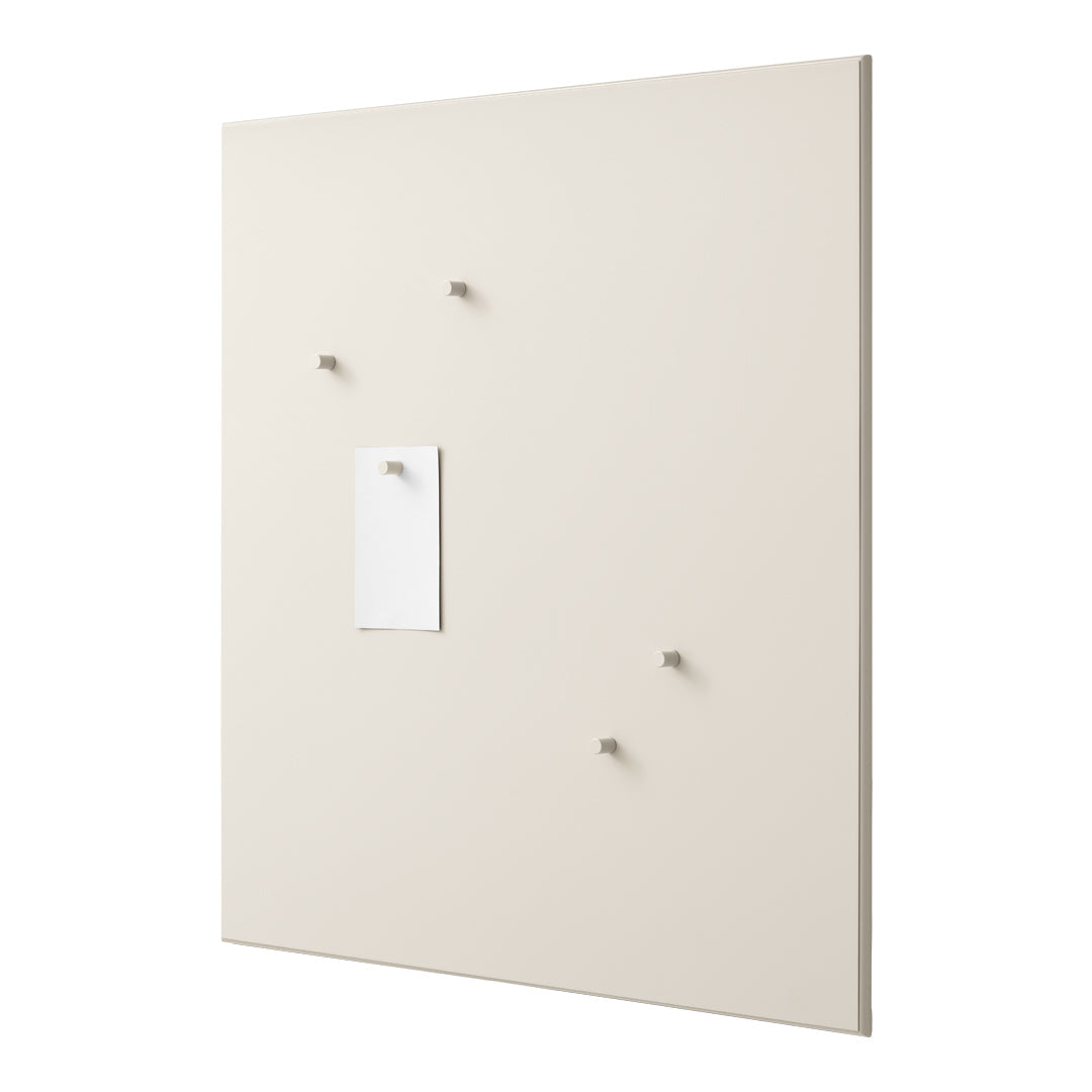 Neutral beige wall panel with minimalistic design and subtle white note holder. Perfect for modern decor.