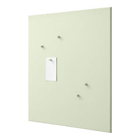 Light green wall panel with four matching pegs and a white sheet of paper for notes. Clean and modern design.