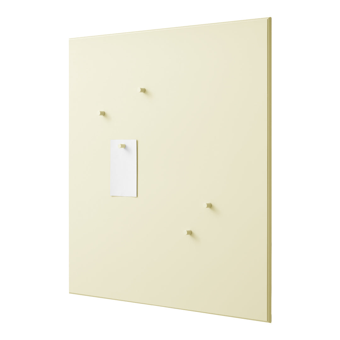 Light yellow memo board with minimalist design, featuring subtle hooks and a white note-holder. Perfect for organized spaces.