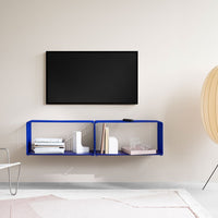 Modern blue shelf design with white accents against a neutral wall, featuring subtle geometric patterns.