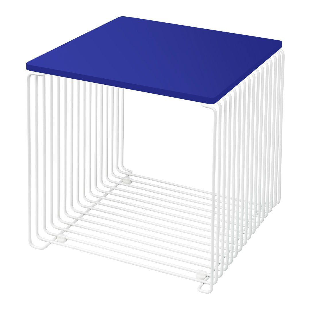 Square table with a bold blue top and white wire frame, featuring clean lines and modern design.