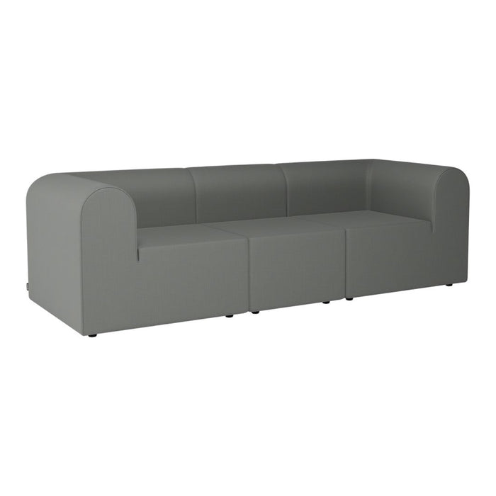 Stylish gray modular sofa with a smooth texture and minimalist design, perfect for modern living spaces.