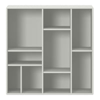 Light gray modular shelf unit with a clean, minimalist design and multiple open compartments for versatile storage.