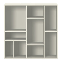 Light gray shelving unit with a minimalist design and multiple compartments for versatile storage solutions.