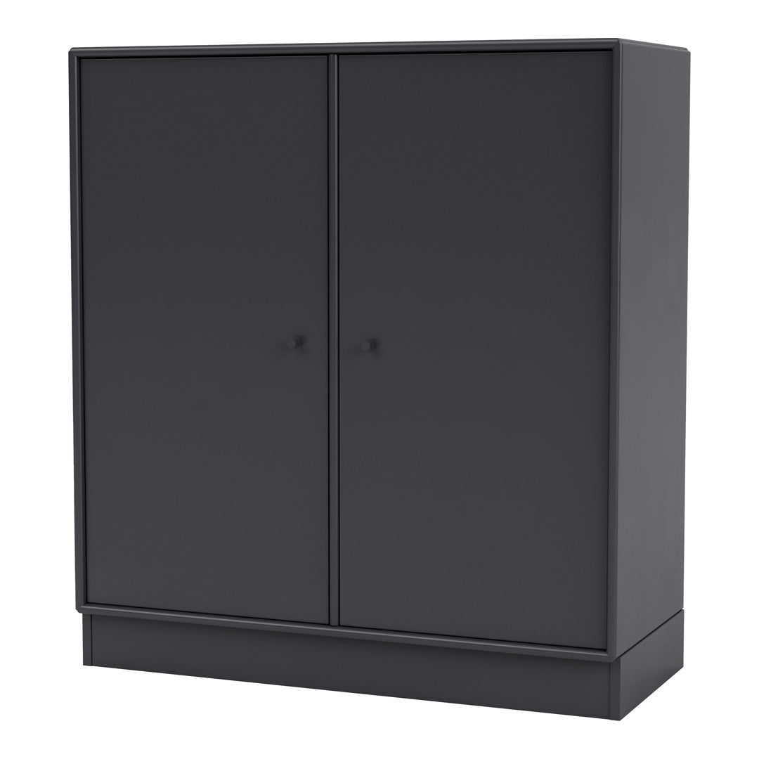 Sleek black storage cabinet with a smooth matte finish and minimalist design, ideal for modern interiors.