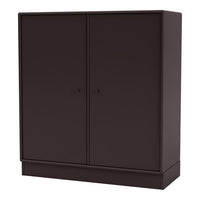 Dark brown minimalist storage cabinet featuring a smooth, solid surface and sleek design. Perfect for modern decor.