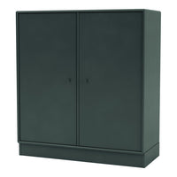 Dark green modern storage cabinet with a sleek matte finish and minimalist design, featuring flat panel doors.