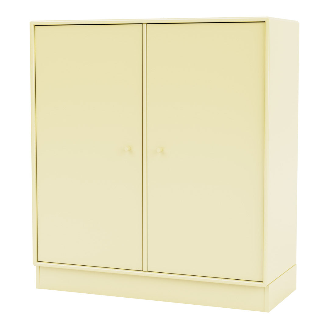 "Stylish yellow storage cabinet with a smooth finish and minimalistic design, perfect for any modern space."