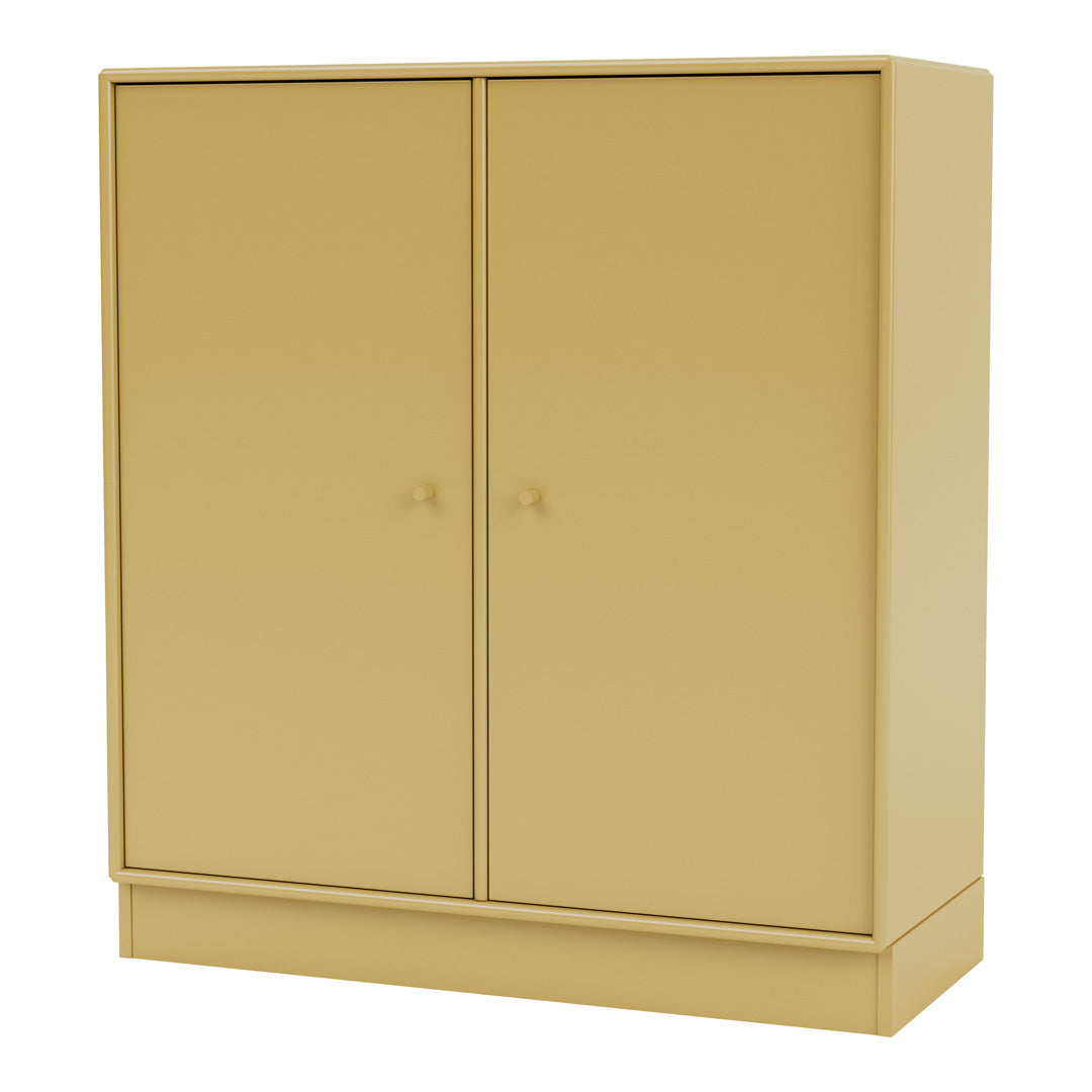 Stylish yellow cabinet with smooth, matte finish and minimalist design, perfect for modern interiors.