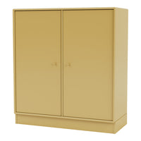 Stylish yellow cabinet with smooth, matte finish and minimalist design, perfect for modern interiors.
