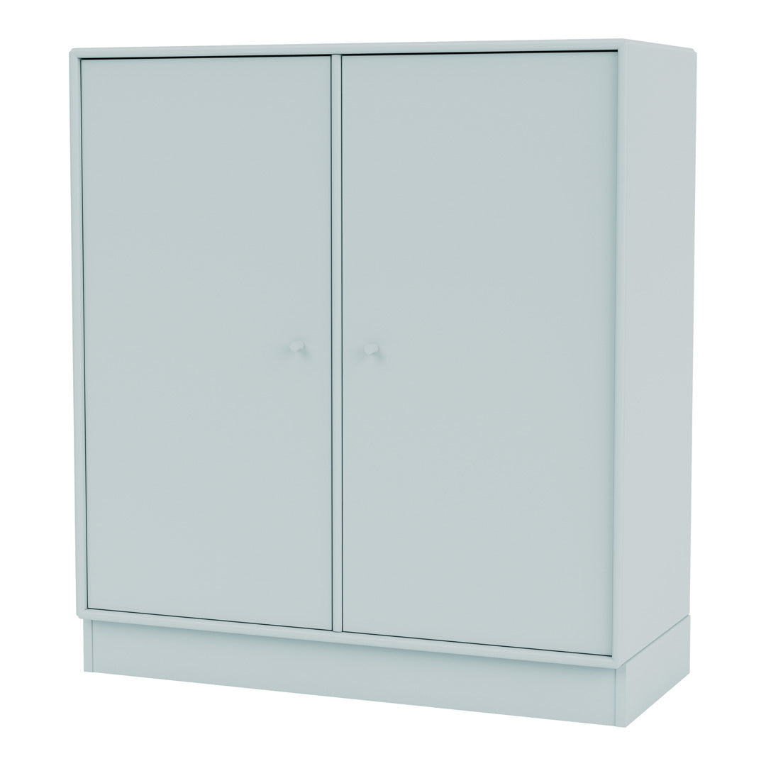 Light blue cabinet with a smooth finish and minimalist design, featuring two flat panel doors.