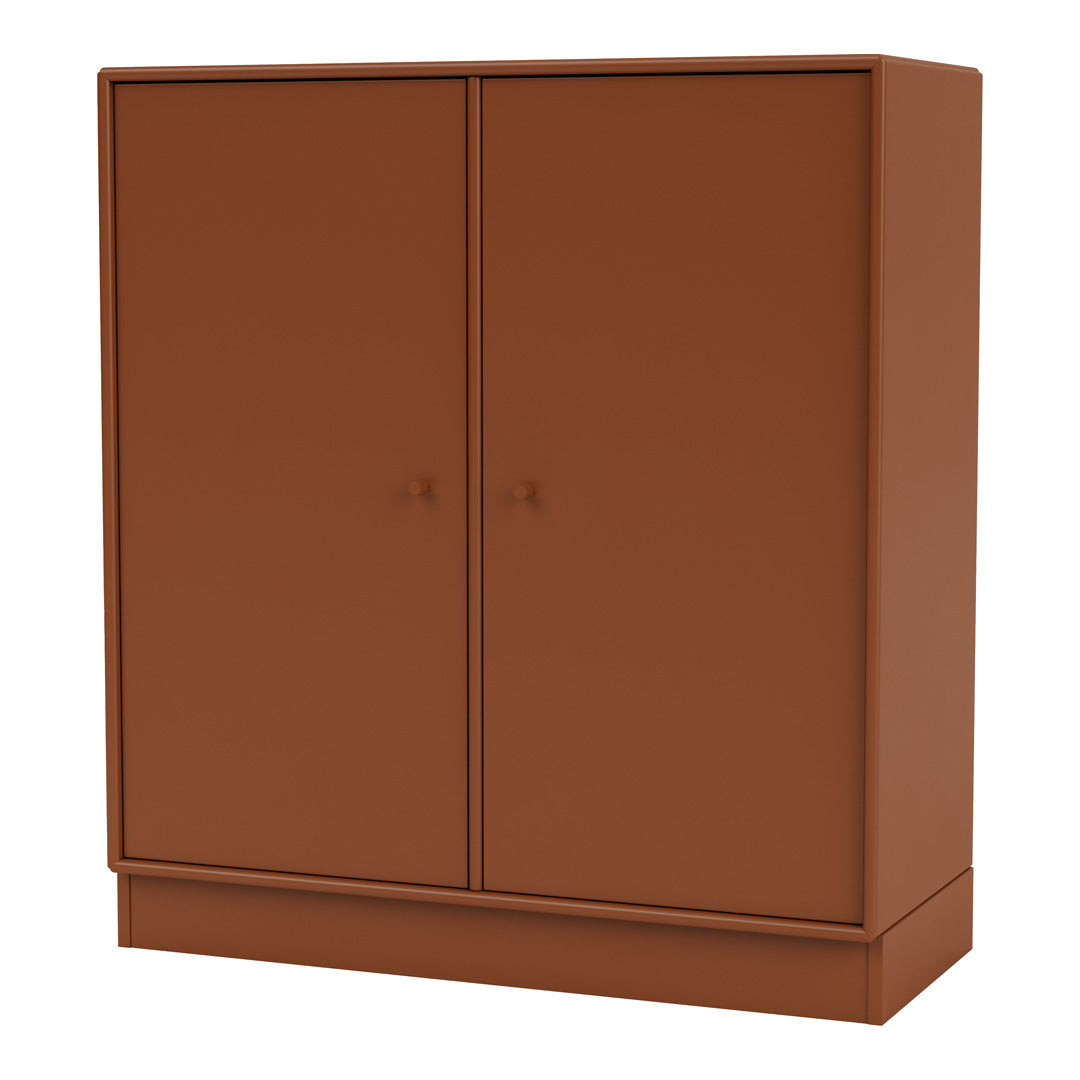 Rust-colored storage cabinet with a minimalist design and smooth, matte finish. Perfect for modern interiors.