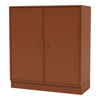 Rust-colored storage cabinet with a minimalist design and smooth, matte finish. Perfect for modern interiors.