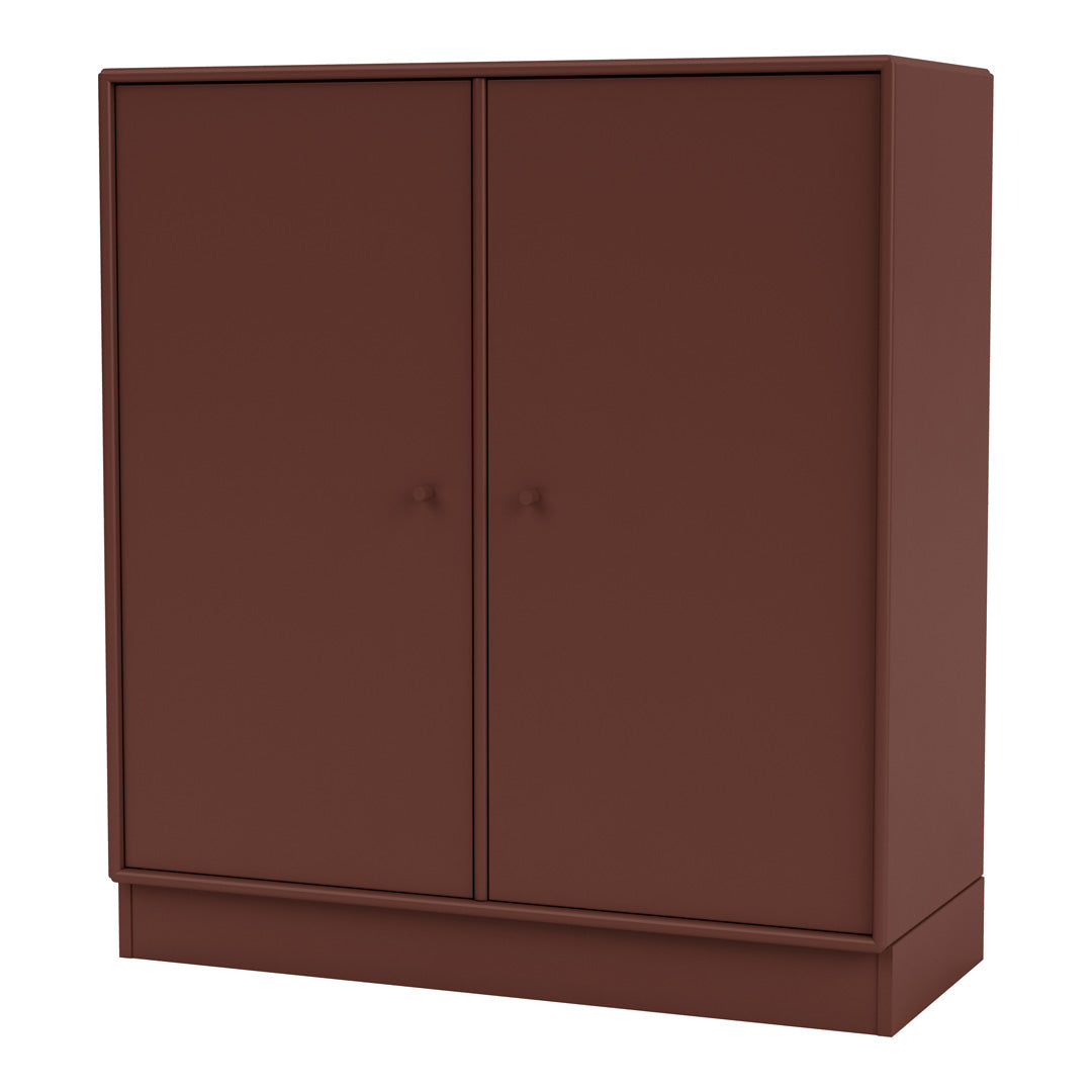 Burgundy double-door cabinet with a smooth matte finish, ideal for modern interior decor.