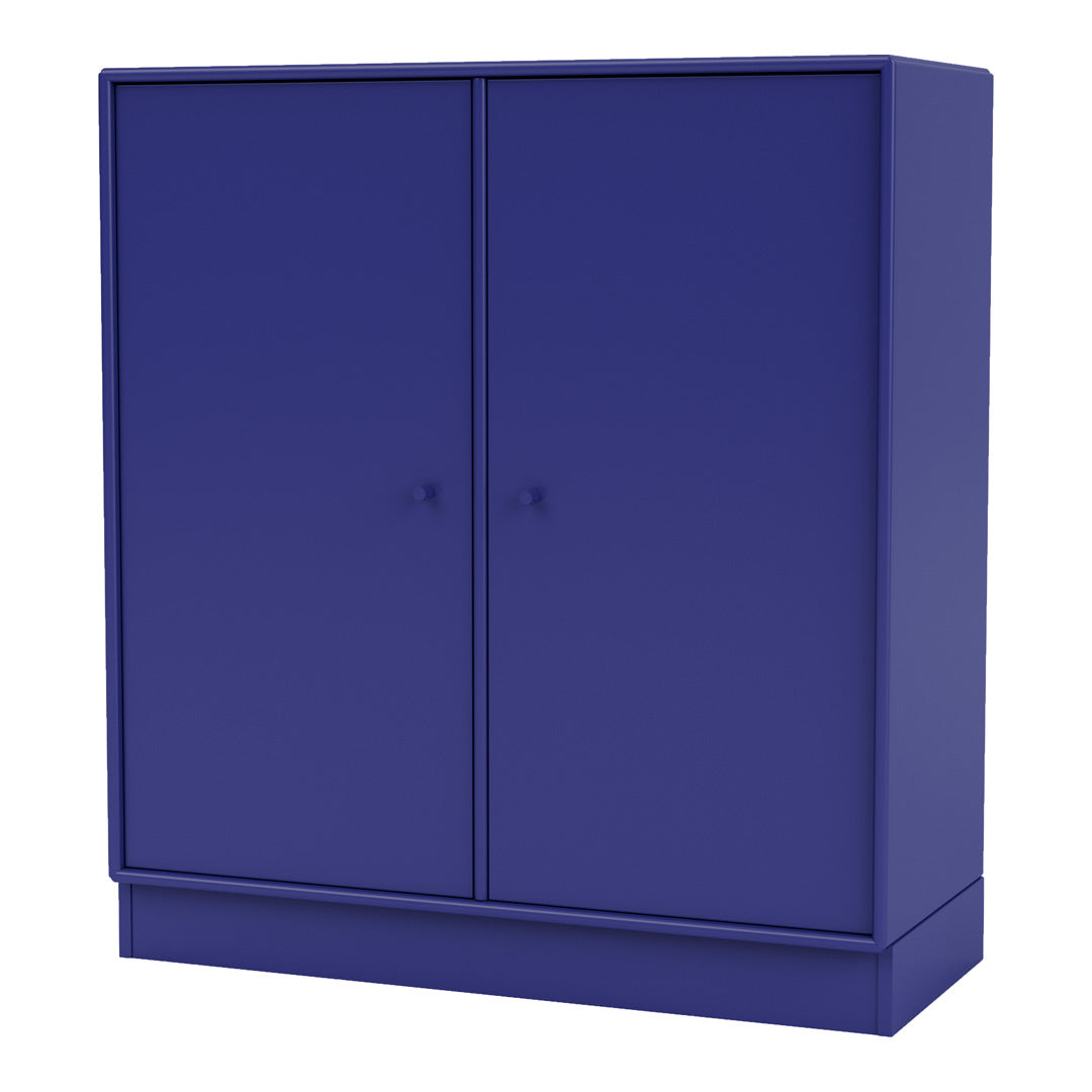 "Solid deep blue storage cabinet with smooth finish and minimalist design, perfect for modern interiors."