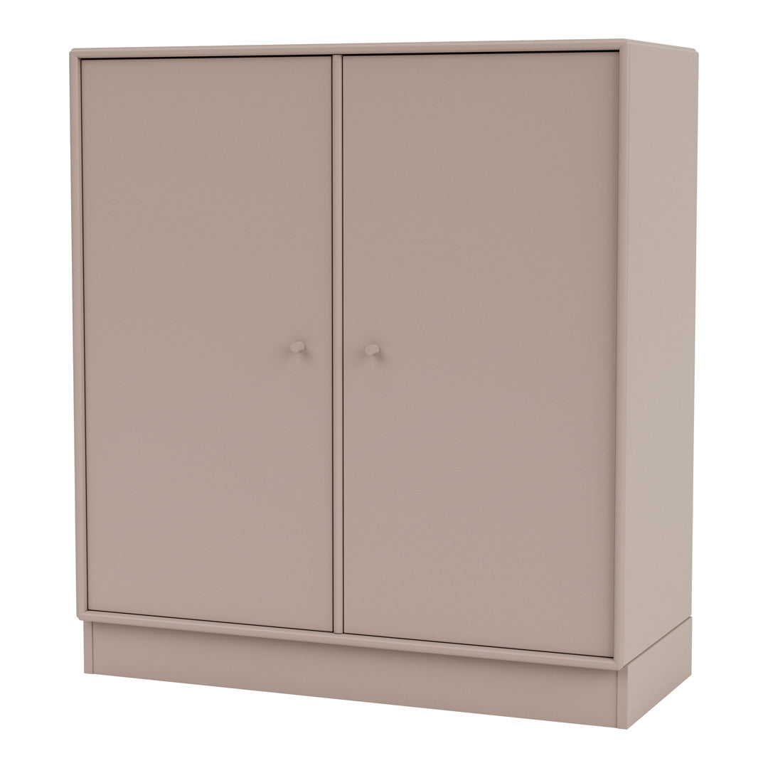 Blush pink double-door cabinet with a smooth, matte finish and minimalistic design. Ideal for modern interiors.