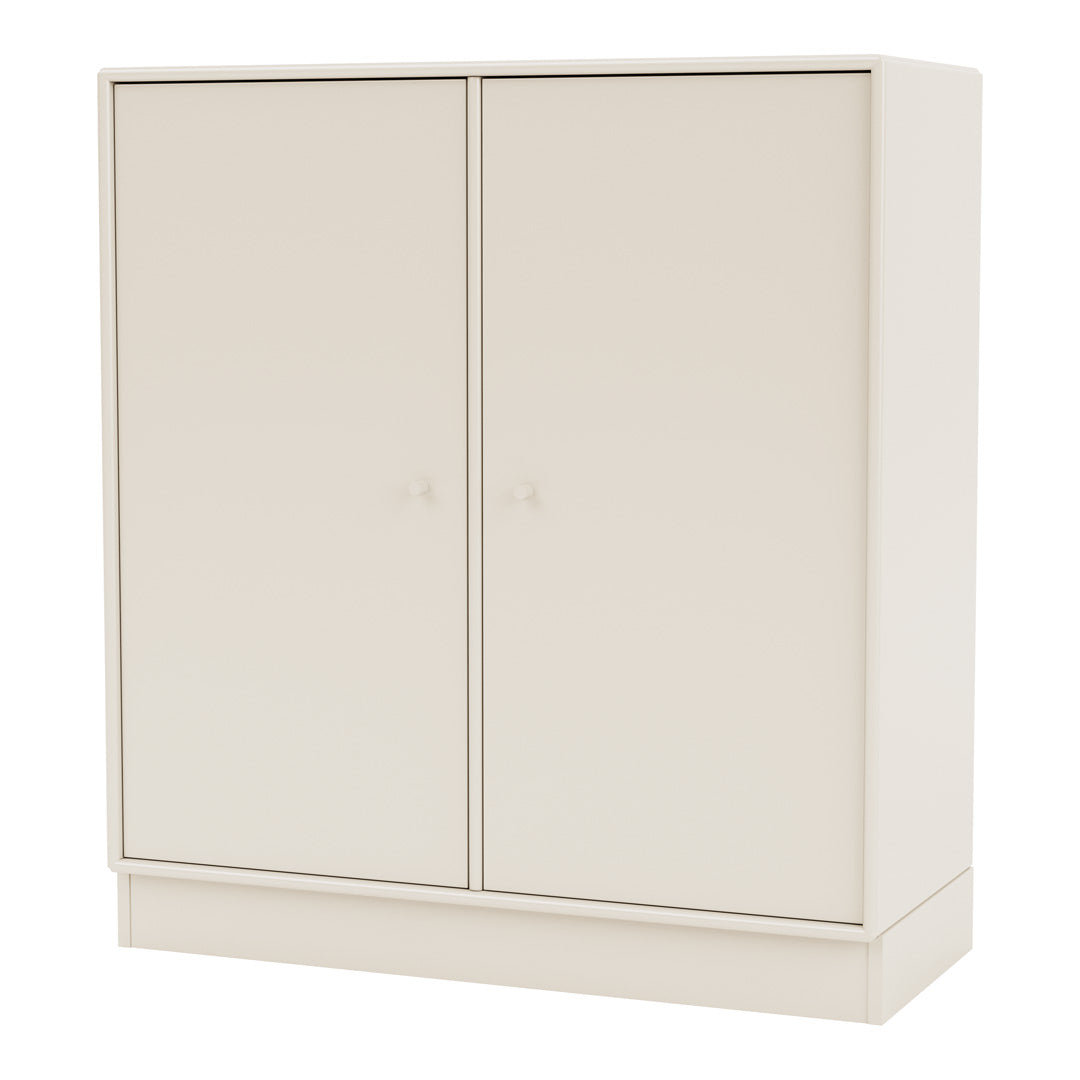 Cream-colored storage cabinet with smooth, minimalist design and subtle matte finish. Ideal for modern decor.