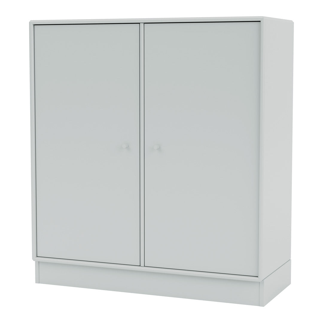 Minimalist white storage cabinet with smooth finish and sleek design, ideal for modern decor.