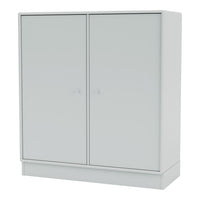 Minimalist white storage cabinet with smooth finish and sleek design, ideal for modern decor.