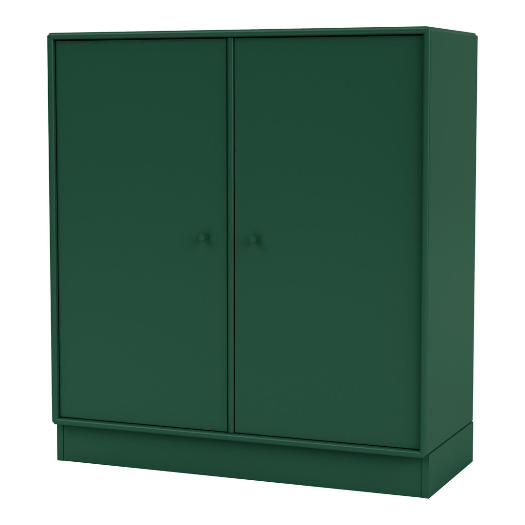 Green two-door cabinet with a sleek, minimalist design and matte finish for a modern home aesthetic.